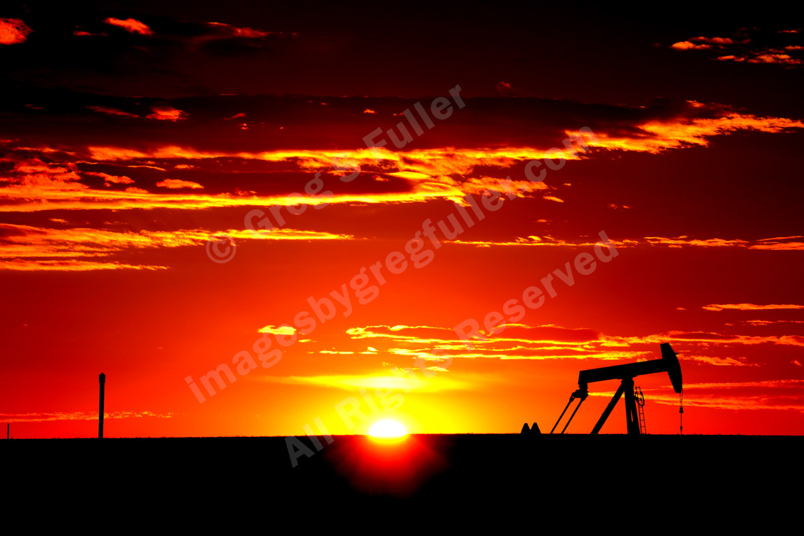 A Vibrant Red & Gold Pumpjack Sunrise - Eastern Plains of Colorado