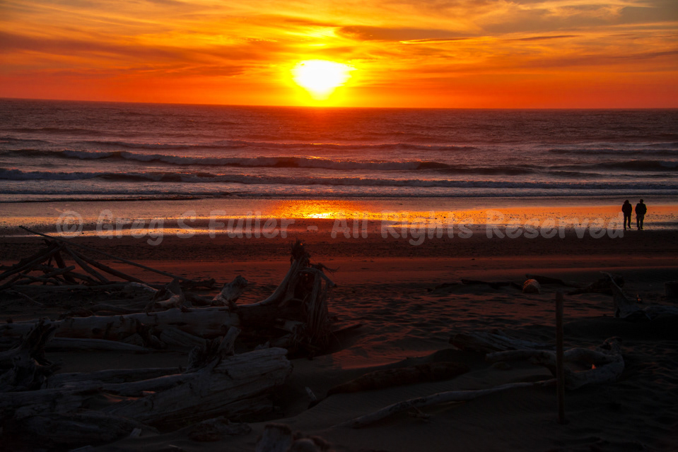 A Couple Walking on the Beach, Enjoying an Oregon Coast Sunset - Gold Beach, Oregon