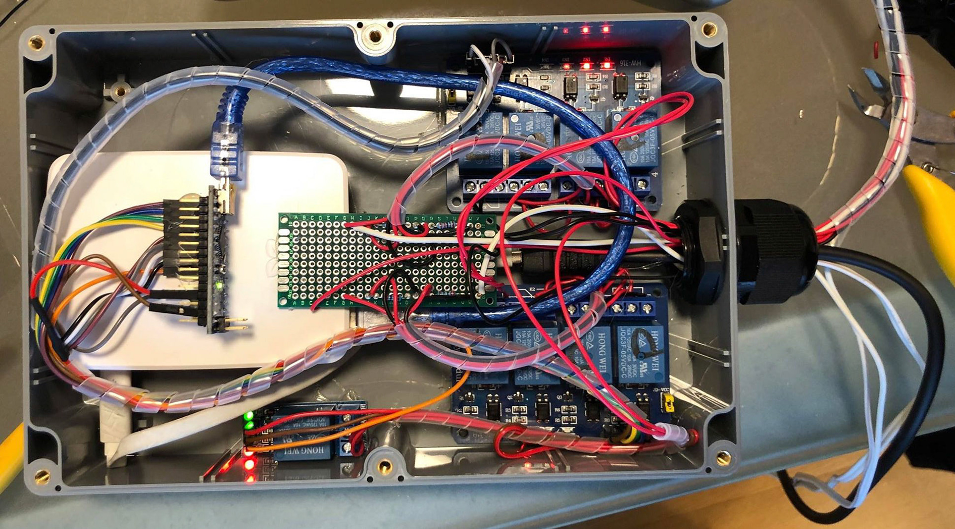 Inside the Arduino box encasing relay board & Arduino & raspberry pi