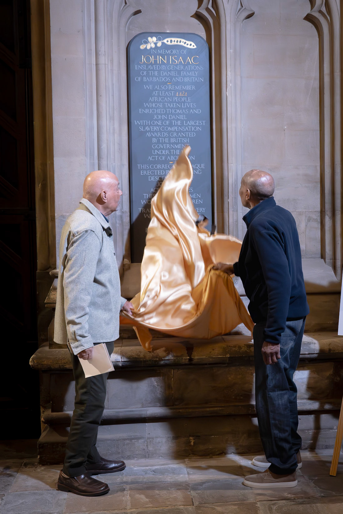 An event to mark the unveiling of a monument to John Isaac at Bristol Cathedral. October 2024.