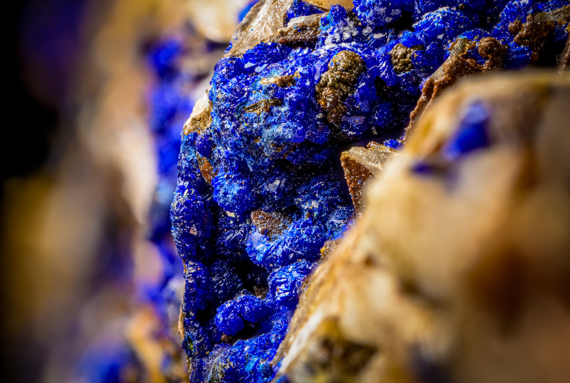 Ultra-macro photo of azurite (blue) and malachite (green) on quartz.. This image is a focus-stack of 20 photos.