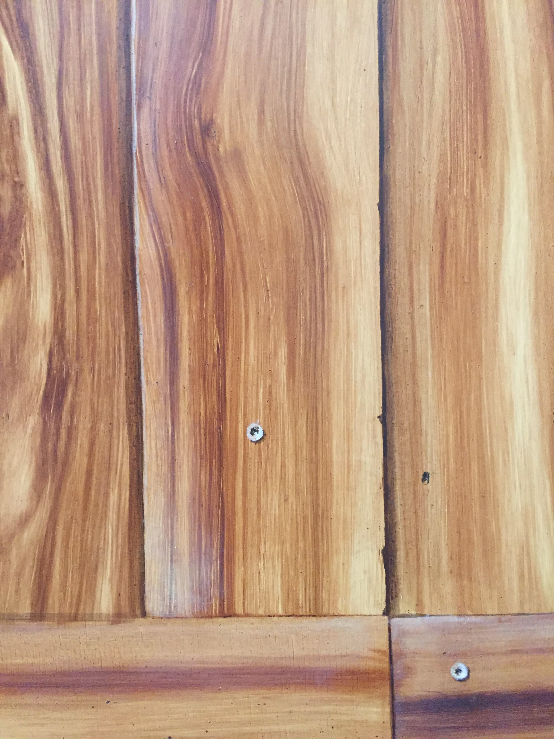 Détail de trompe l’œil sur imitation de noyer