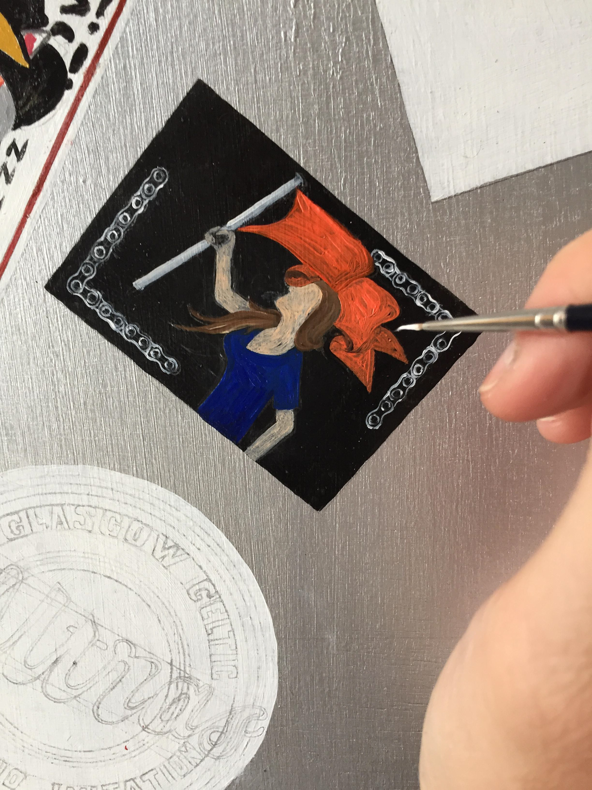 Détail de la reproduction en peinture d'un sticker