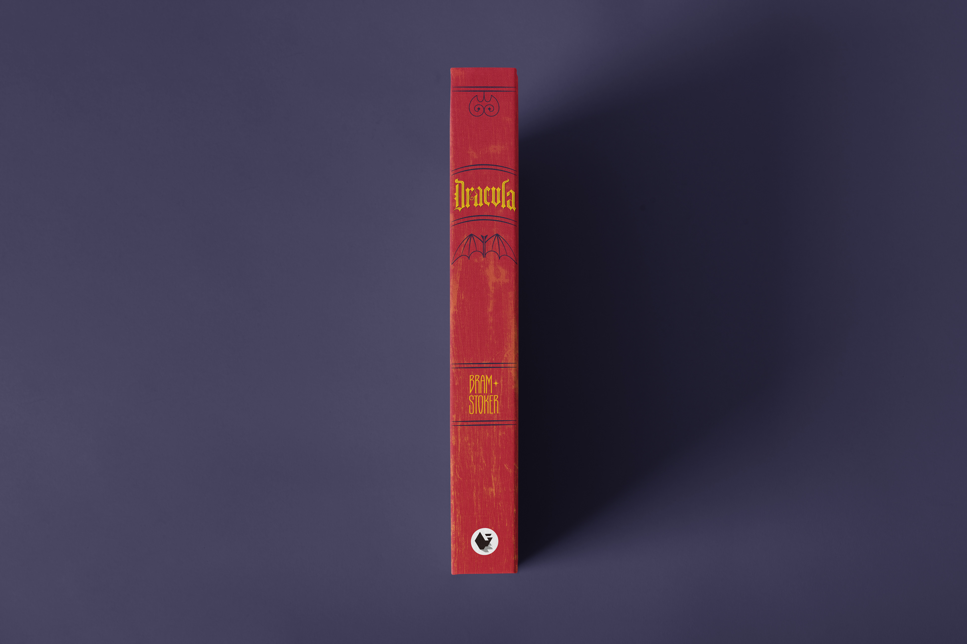 Red spine for Bram Stoker’s Dracula, featuring yellow title and author lettering with ornamental gate and bat motifs.