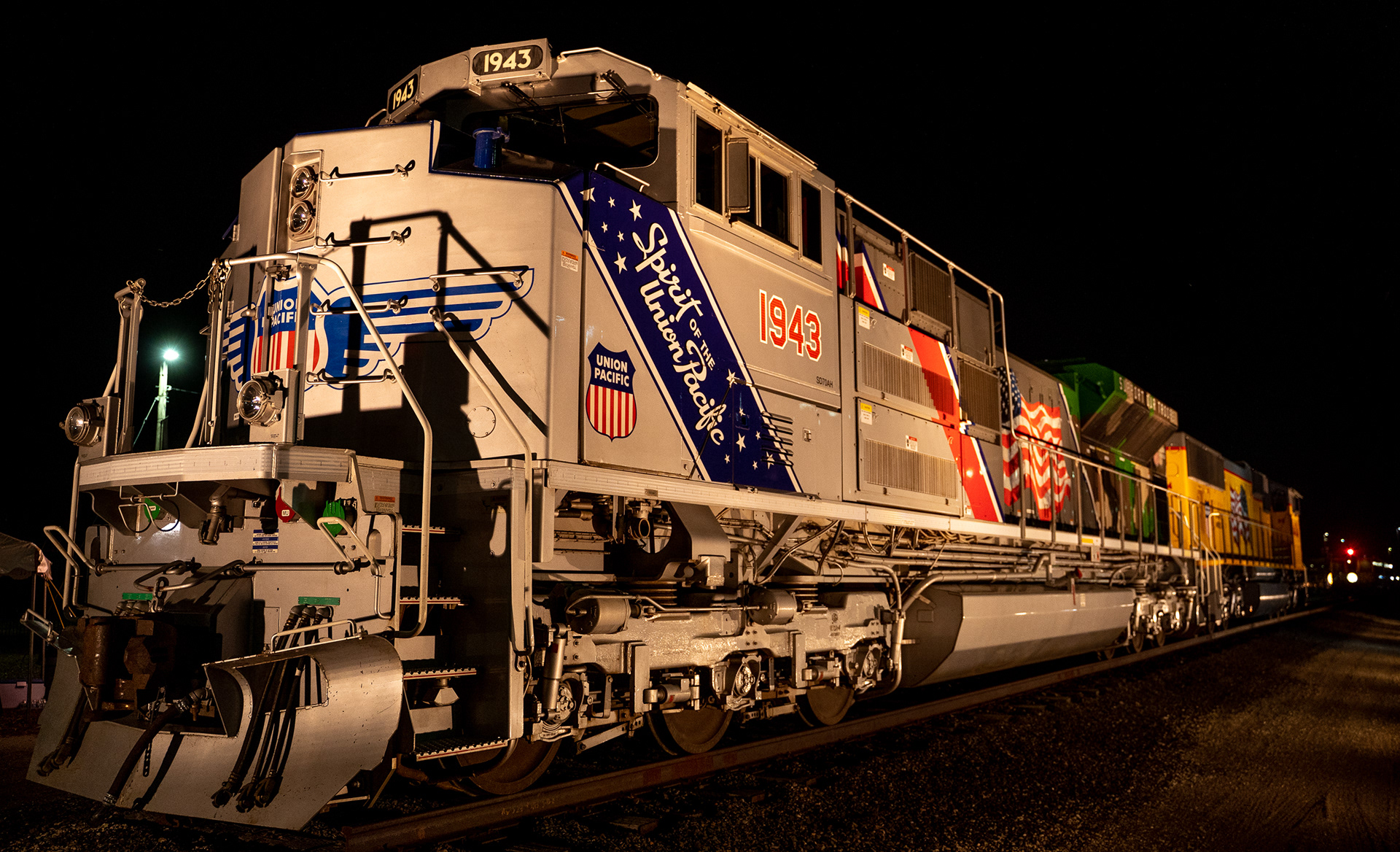 Union Pacific SD70AH 1943 "Spirit of the Union Pacific" and SD70M 4404 sit on display at UP's Home Plate outside TD Ameritrade Park during the College World Series in Omaha, Nebraska. 06.23.21.