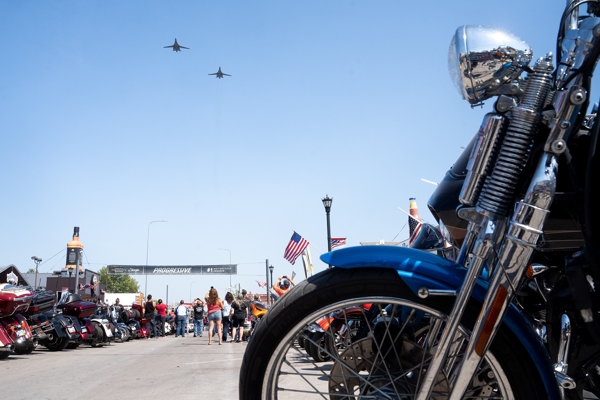 Two B-1B Lancers from Ellsworth AFB fly over Main Street following the Military Appreciation Day ceremony during the fifth day of the 81st Sturgis Motorcycle Rally in Sturgis, South Dakota. 08.09.21.