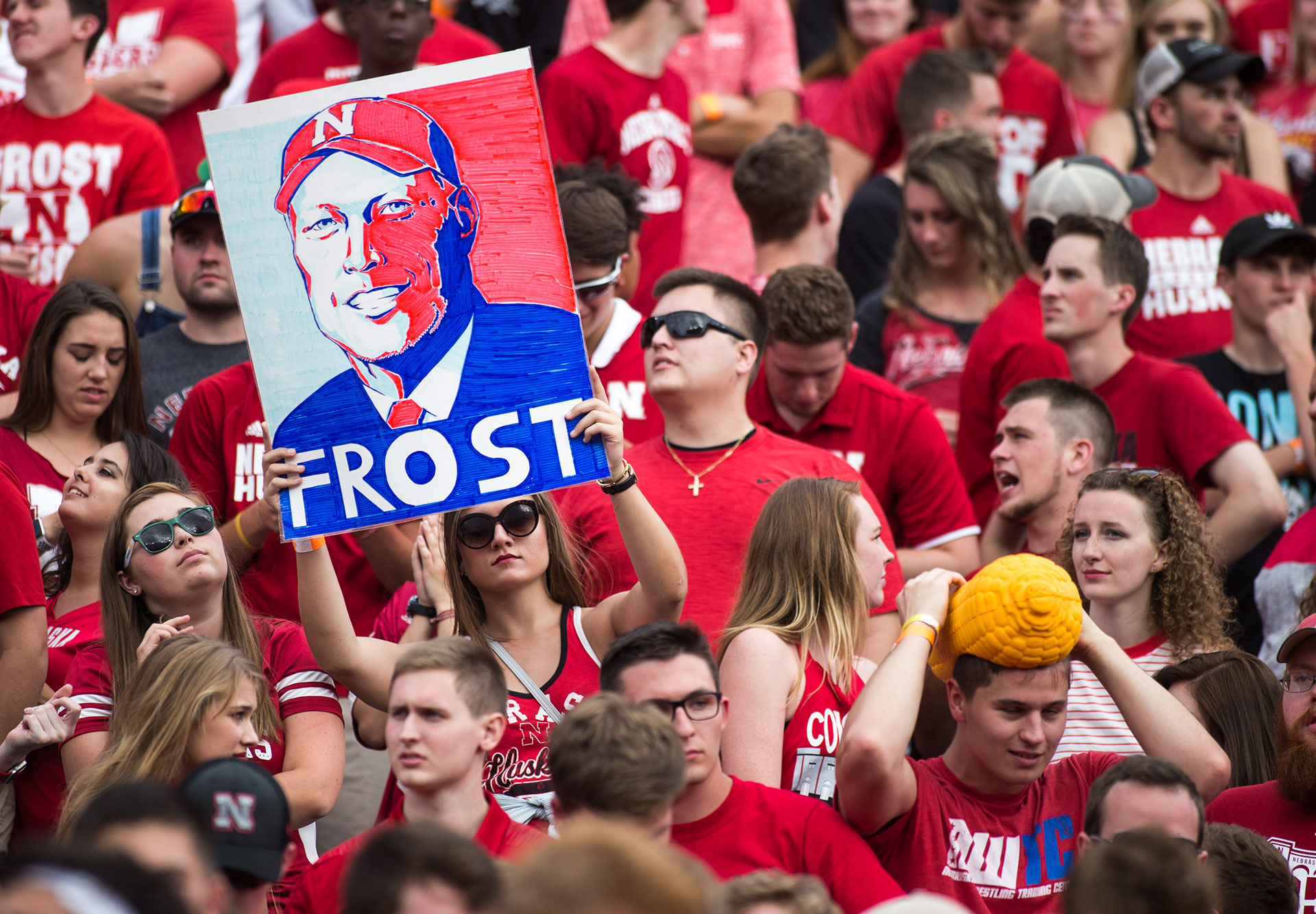 A fan holds a sign with Nebraska coach Scott Frost's face on it during the game against Colorado at Memorial Stadium in Lincoln, Nebraska. 09.08.18.
