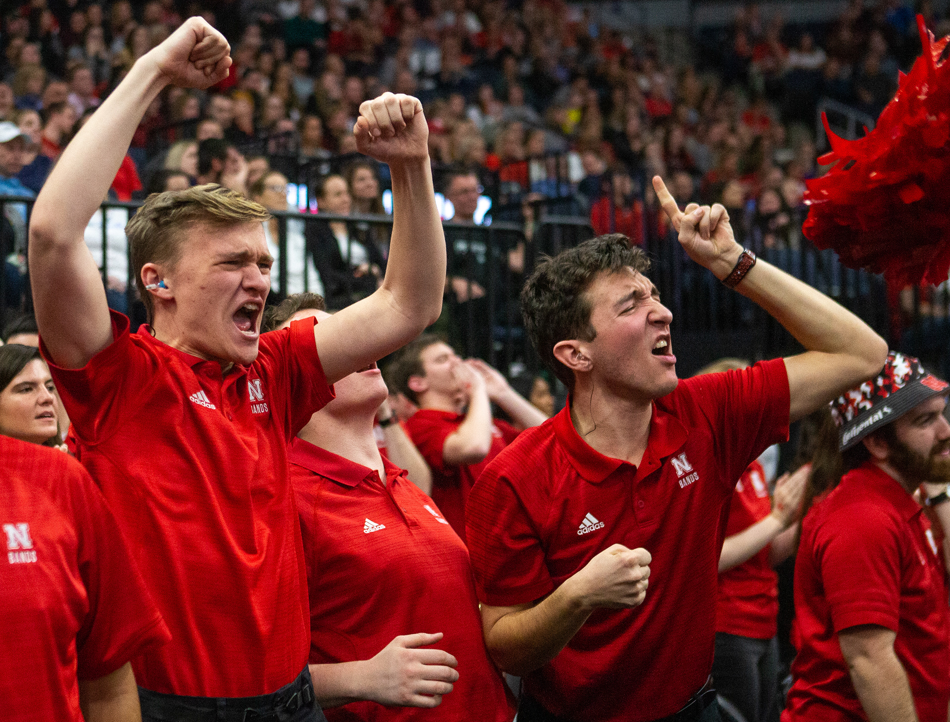 Members of the Nebraska Cornhusker Band celebrate after a Nebraska score in the game against Illinois in the NCAA Volleyball National Semifinals at the Target Center in Minneapolis, Minnesota. 12.13.18.