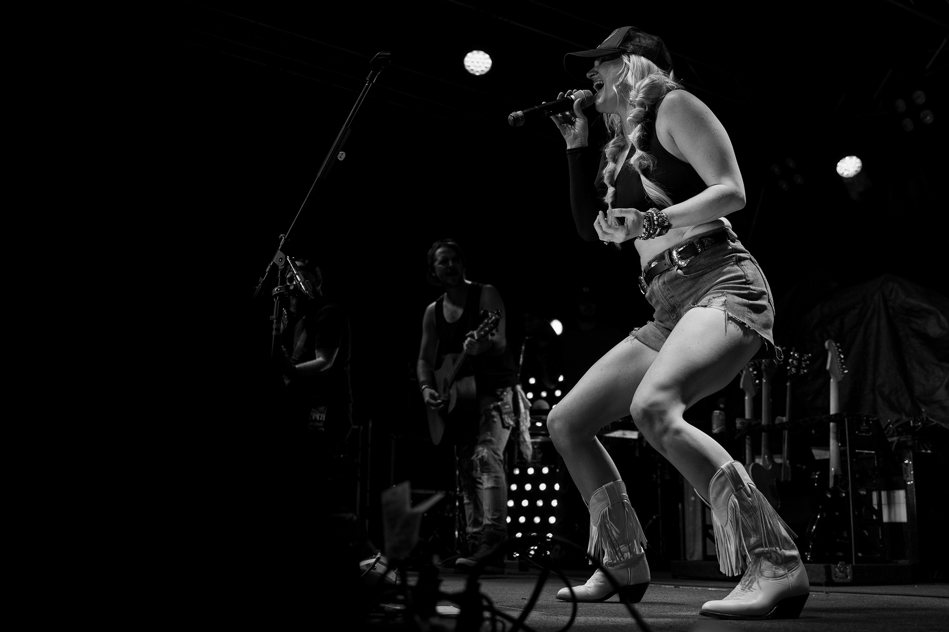Britnee Kellogg performs with Judd Hoos at the Loud American Roadhouse during the seventh day of the 81st Sturgis Motorcycle Rally in Sturgis, South Dakota. 08.12.21.