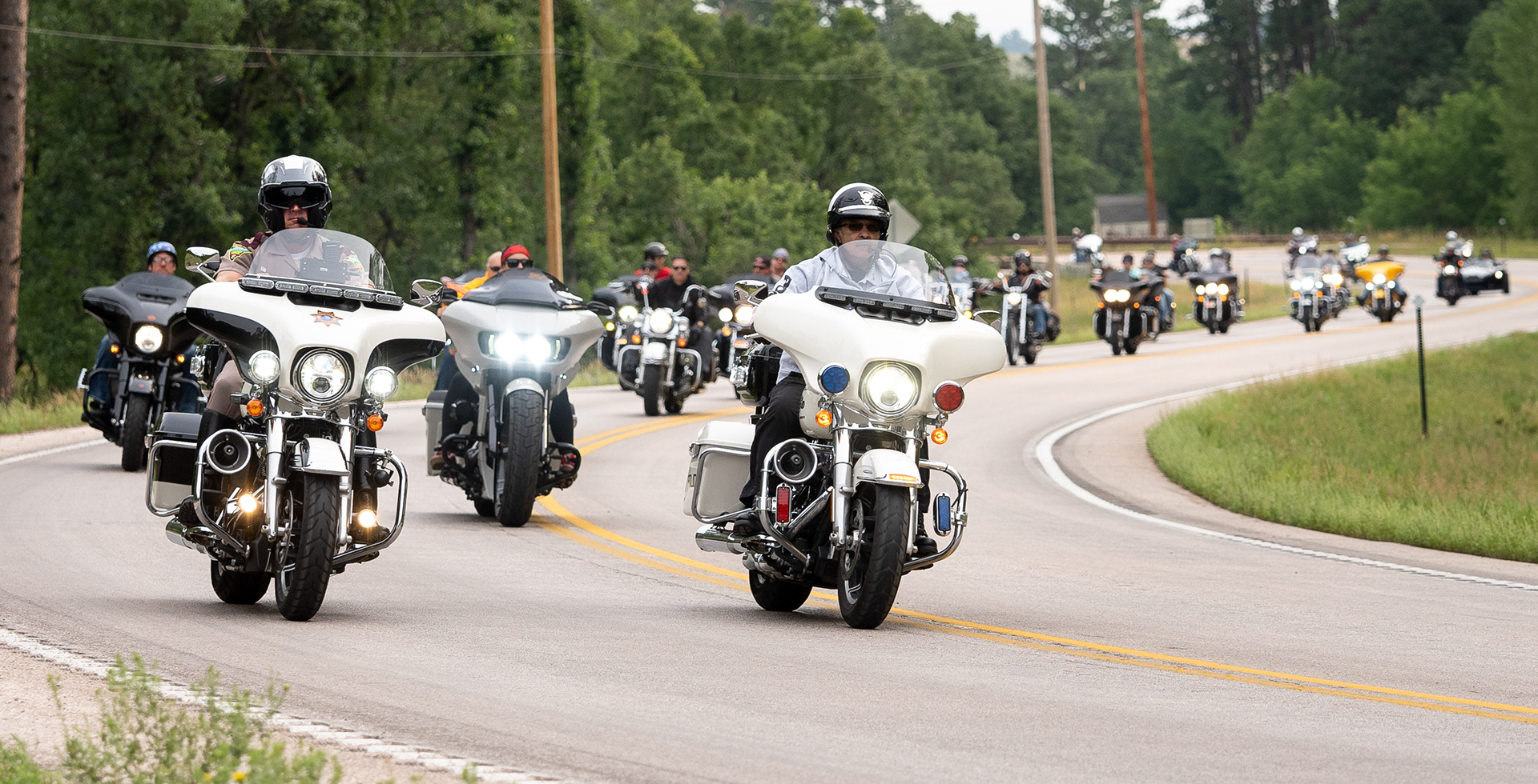 The Sturgis Mayor’s Ride heads south out of town during the second day of the 81st Sturgis Motorcycle Rally in Sturgis, South Dakota. 08.07.21.