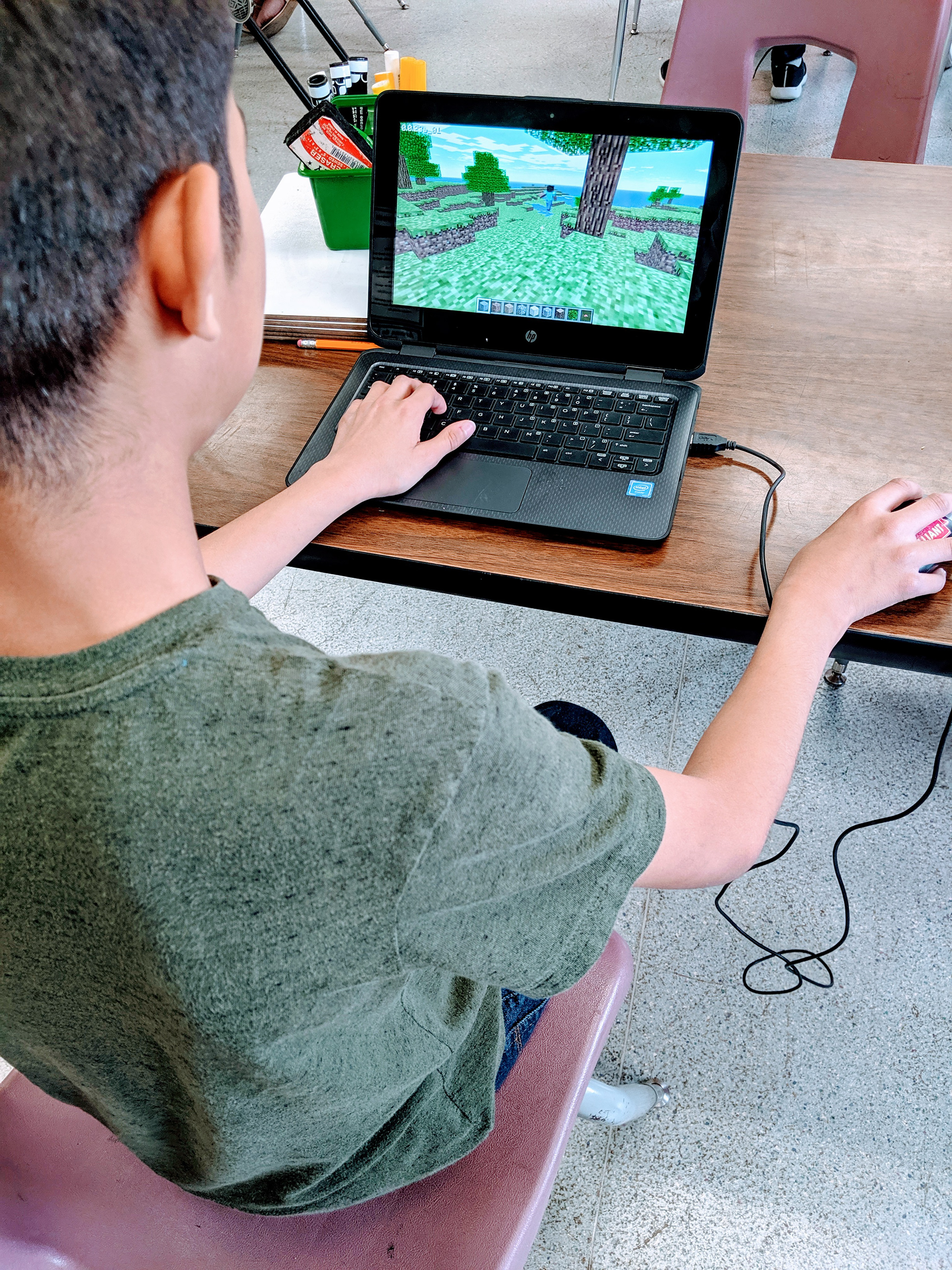 Students on their laptops Minecraft 2019