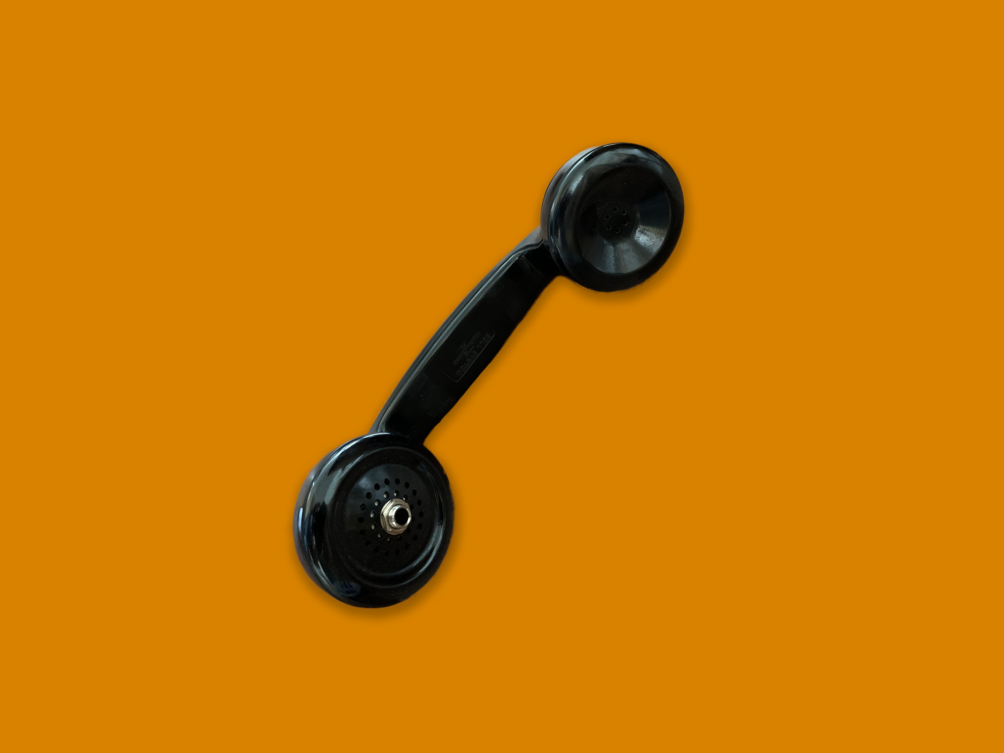 Handheld phone converted into microphone