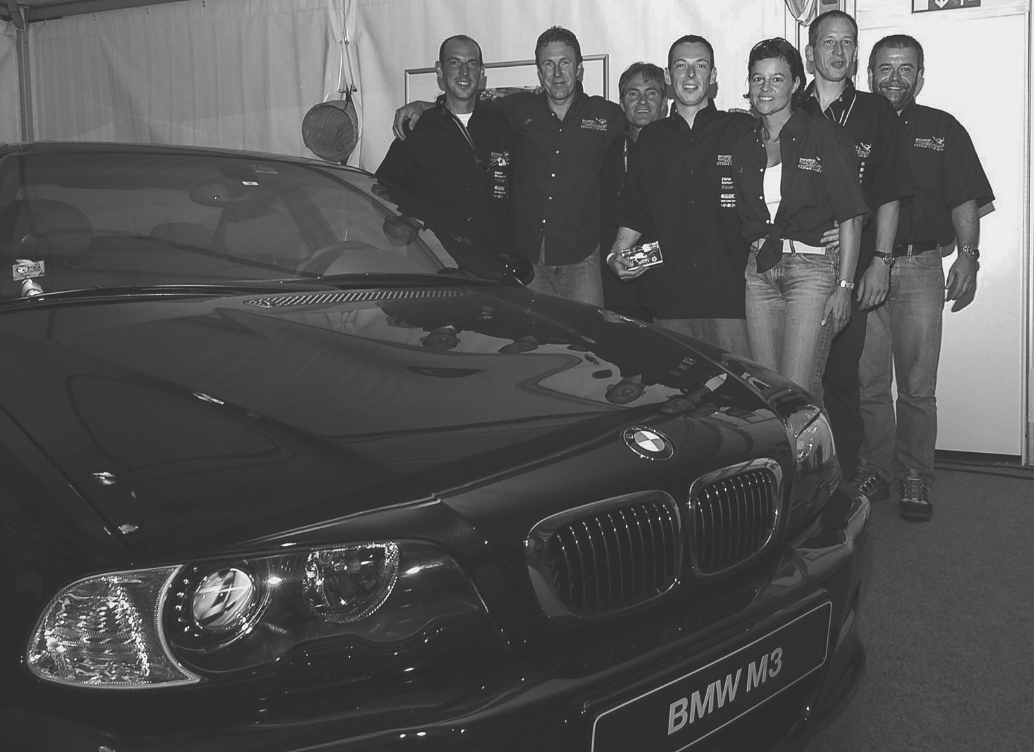 Normen Senger with Andy Hofmann and the team after winning the BMW International BoxerCup in 2003.