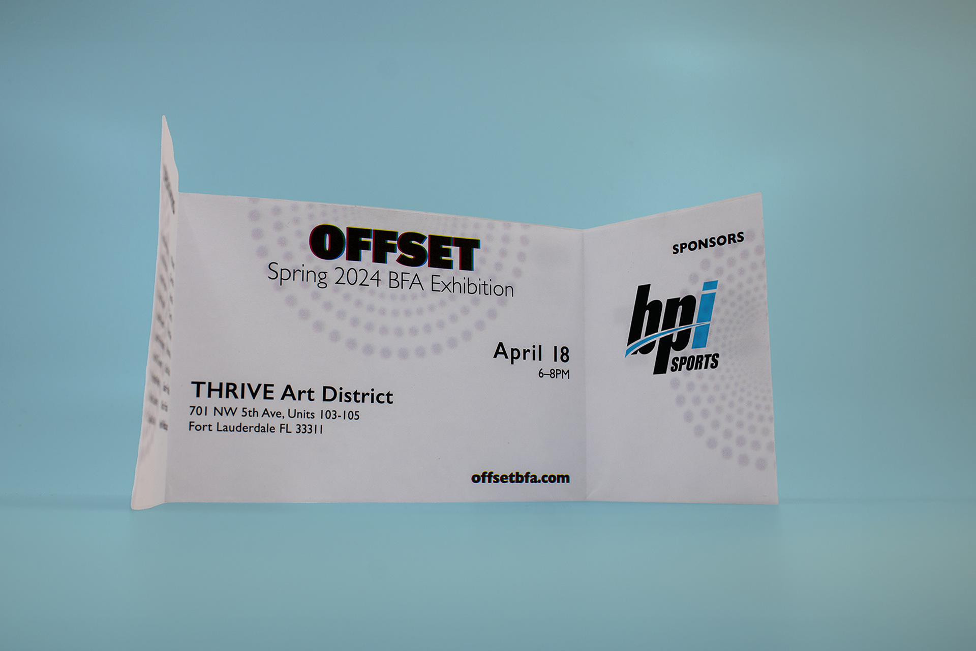 Image of the Offset exhibition invitation opened and standing upright
