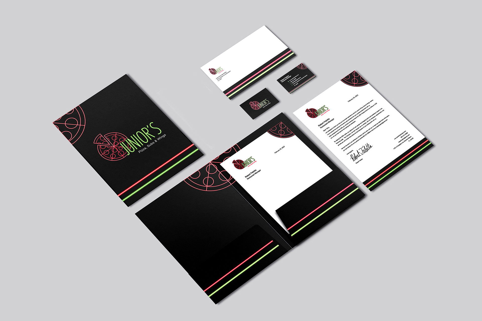 Mock-up of various stationery items featuring Junior’s Pizza, Subs & Wings logo redesign