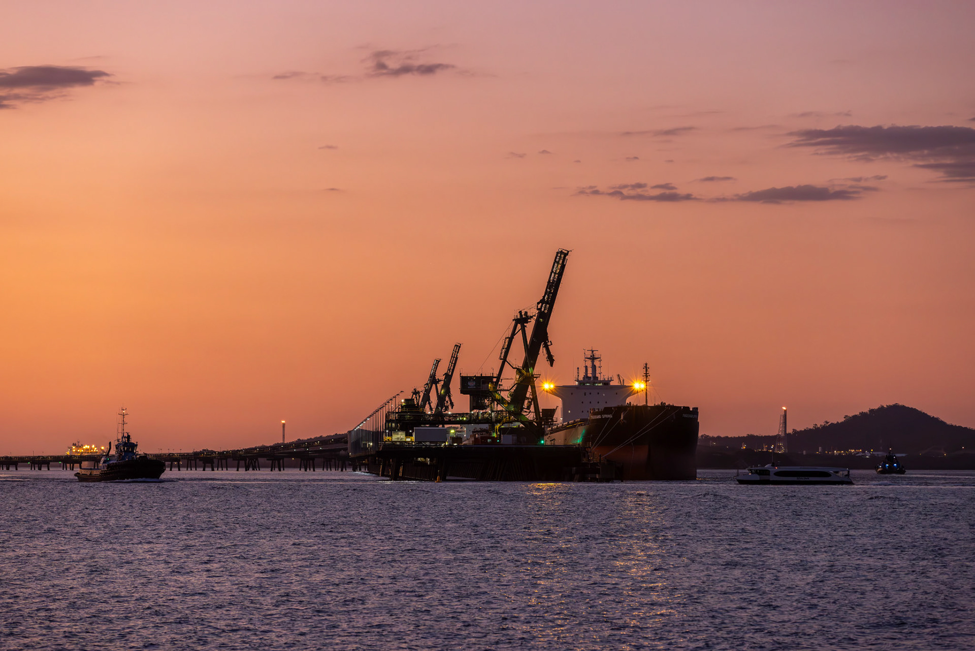Port of Gladstone at dusk Gladstone. As dusk settles over the Port of Gladstone, a ship sits against the glowing horizon, reflecting the important role the port plays in Queensland’s industrial and energy sectors. Known as a major export hub, Gladstone is also emerging as a key player in the renewable energy transformation. The port is poised to support the export of clean energy resources like hydrogen, ensuring that the region remains at the forefront of global energy innovation.