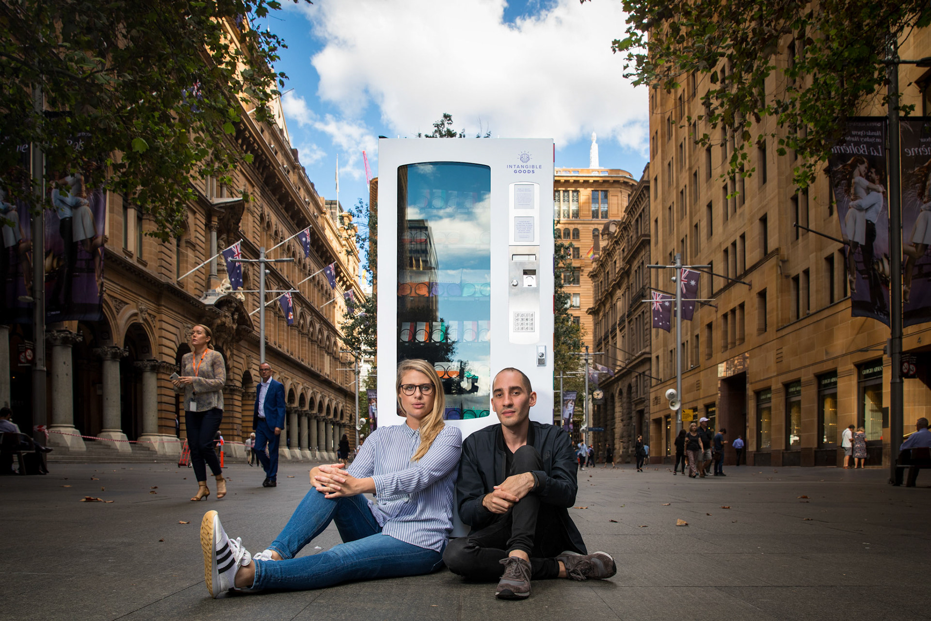 Martin Place, Sydney - 26th March 2018. Created by artists Elizabeth Commandeur and Mark Starmach. Intangible Goods is an installation artwork taking the form of a vending machine. It’s filled with an experimental line of conveniently packaged consumables for the mind. This artwork was commisioned by City of Sydney Art and About. (Model release: ER20180326-Intangible Goods-00413.jpg)
