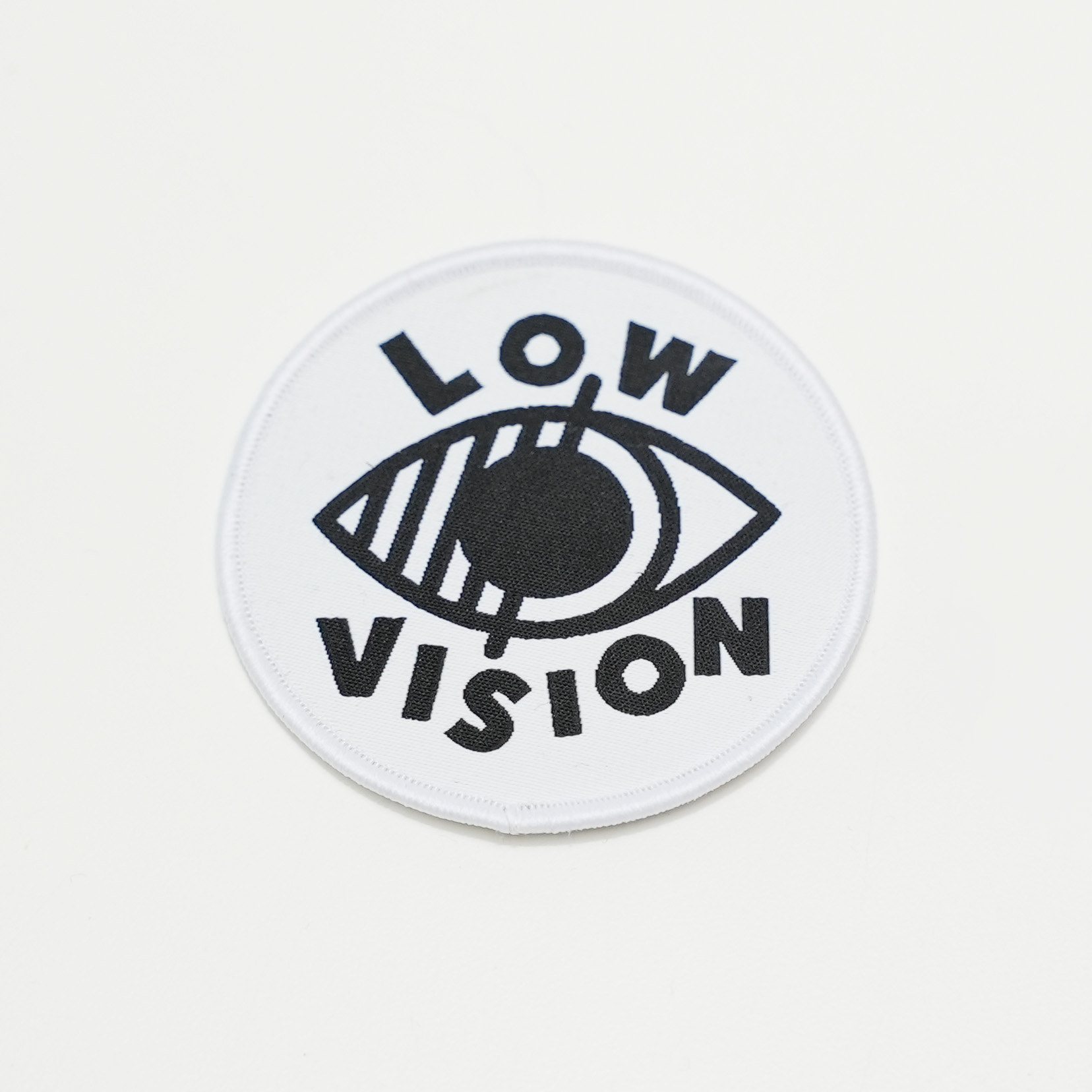 low vision badge
