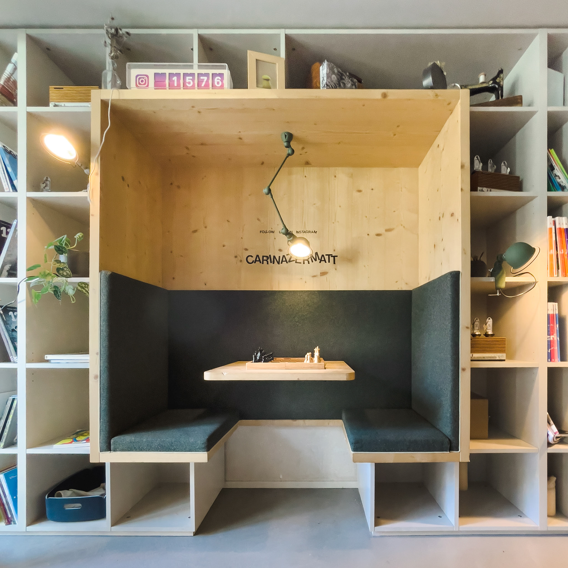 chess inside the floor to ceiling bookcase