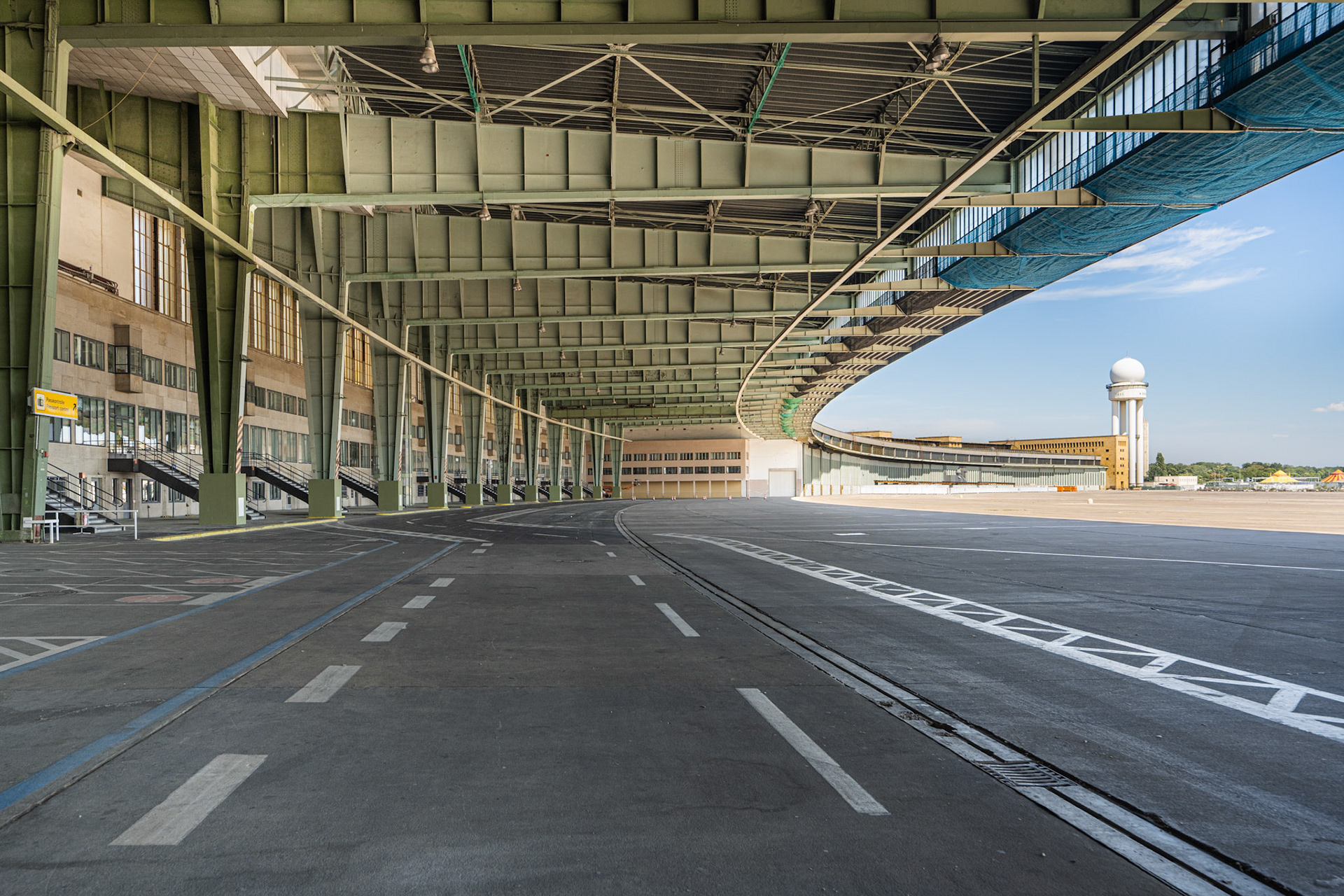 A large roof, supported by steel pillars, allowed planes to park below it