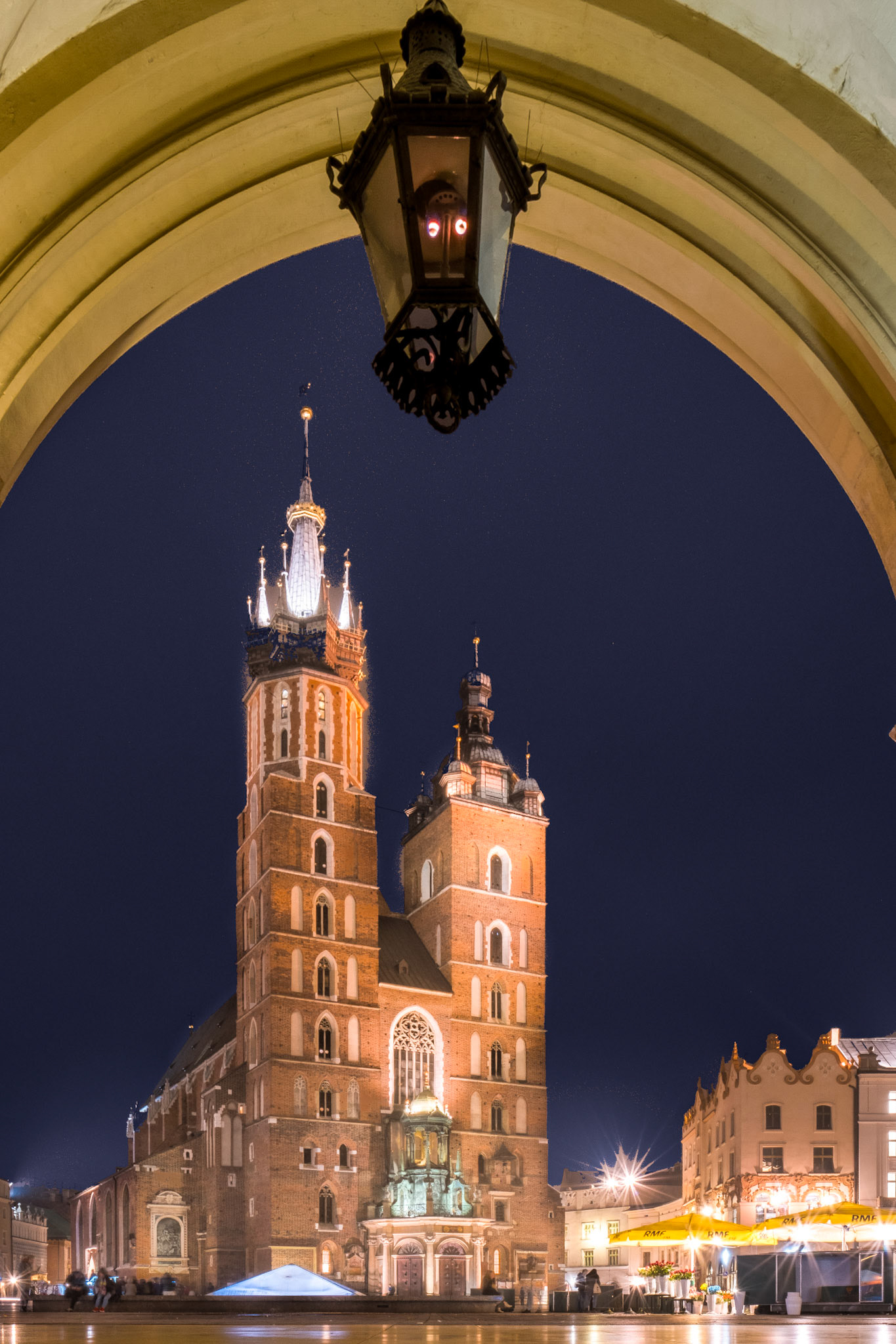 Krakow's main market square and St. Mary's Basilica at night