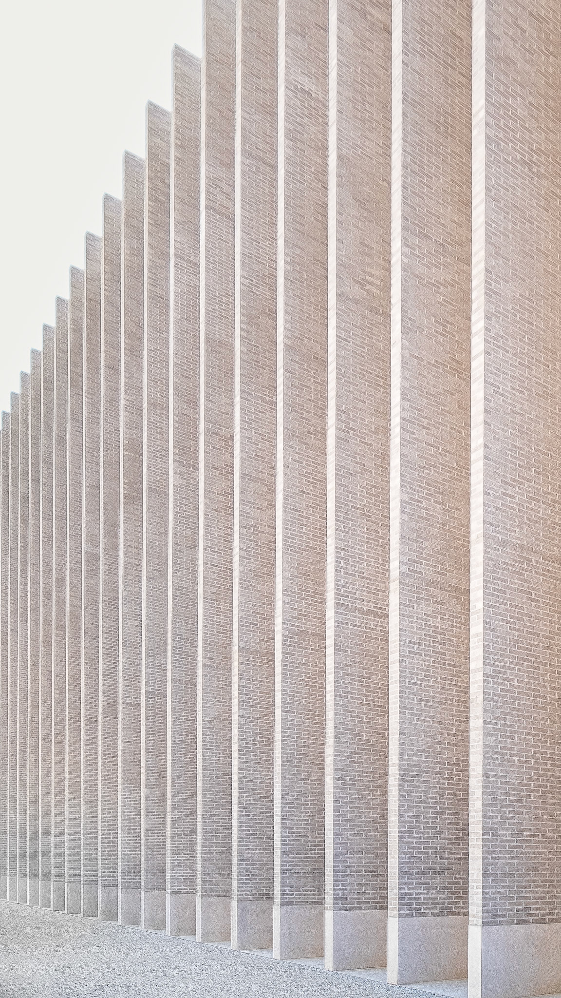deep vertical fins of the MCBA's facade