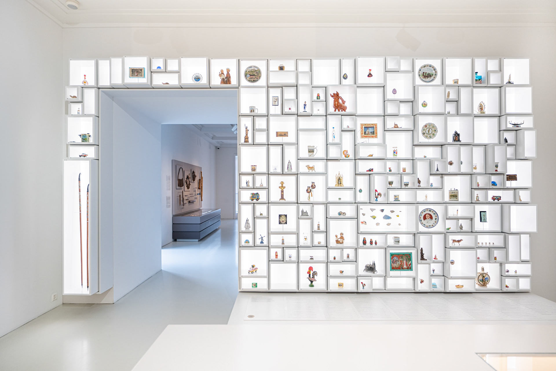 wall-sized display case from the permanent exhibition "Memory – Moments of Remembering and Forgetting"