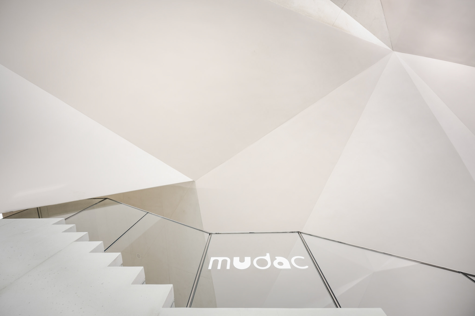 Staircase leading to the mudac exhibition