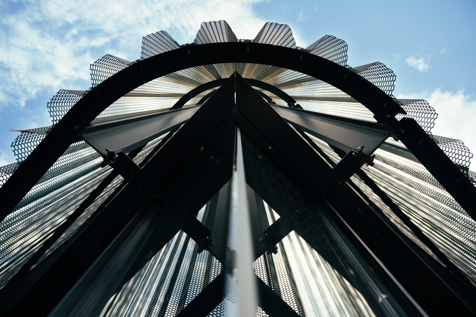 Théâtre de l'Arsenic with its veil of perforated and corrugated aluminum