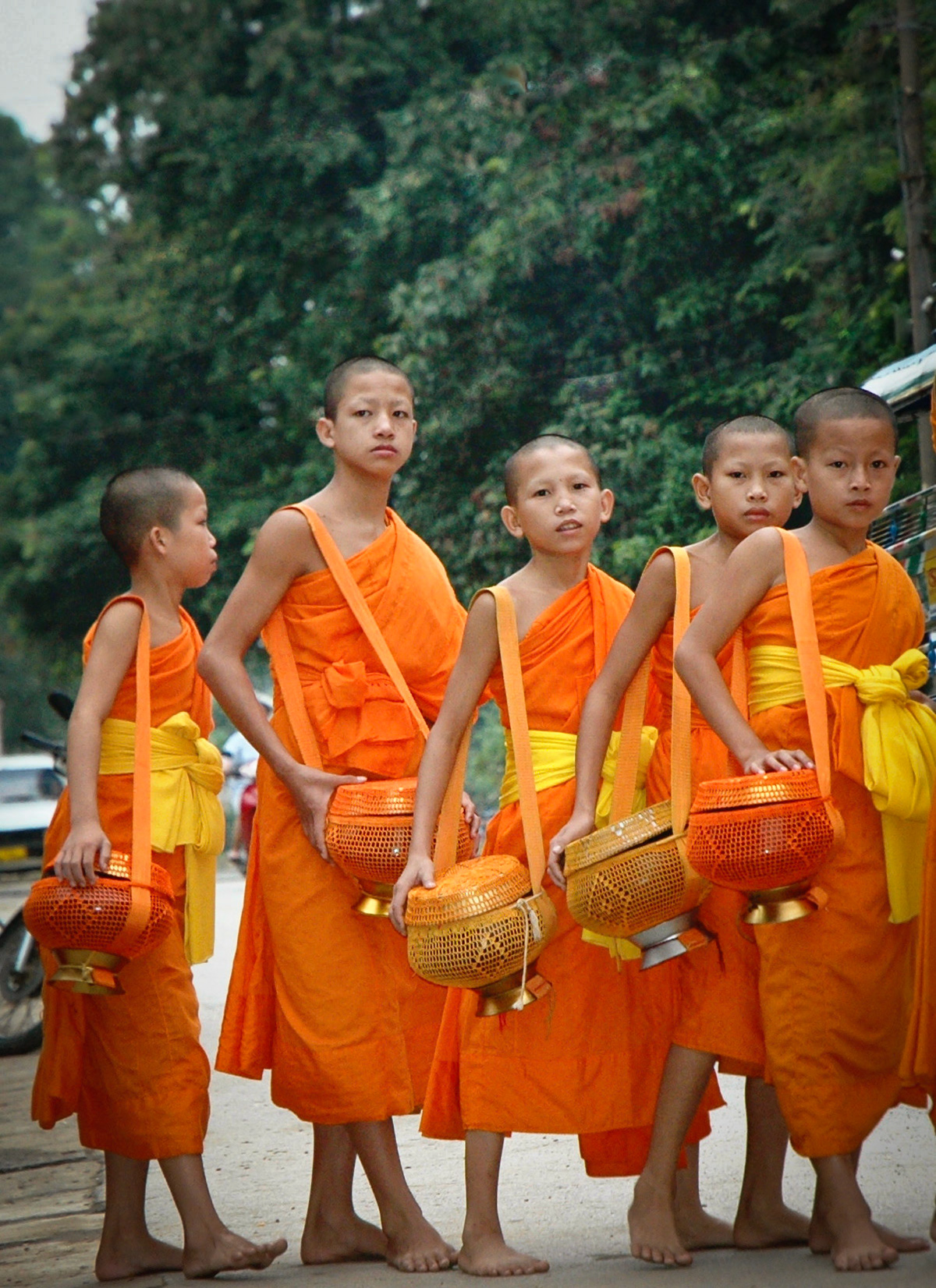Novice monks at morning alms giving - Louang Prabang - Laos
