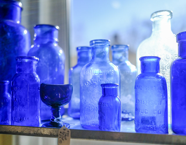 Blue glass still life and interior detail