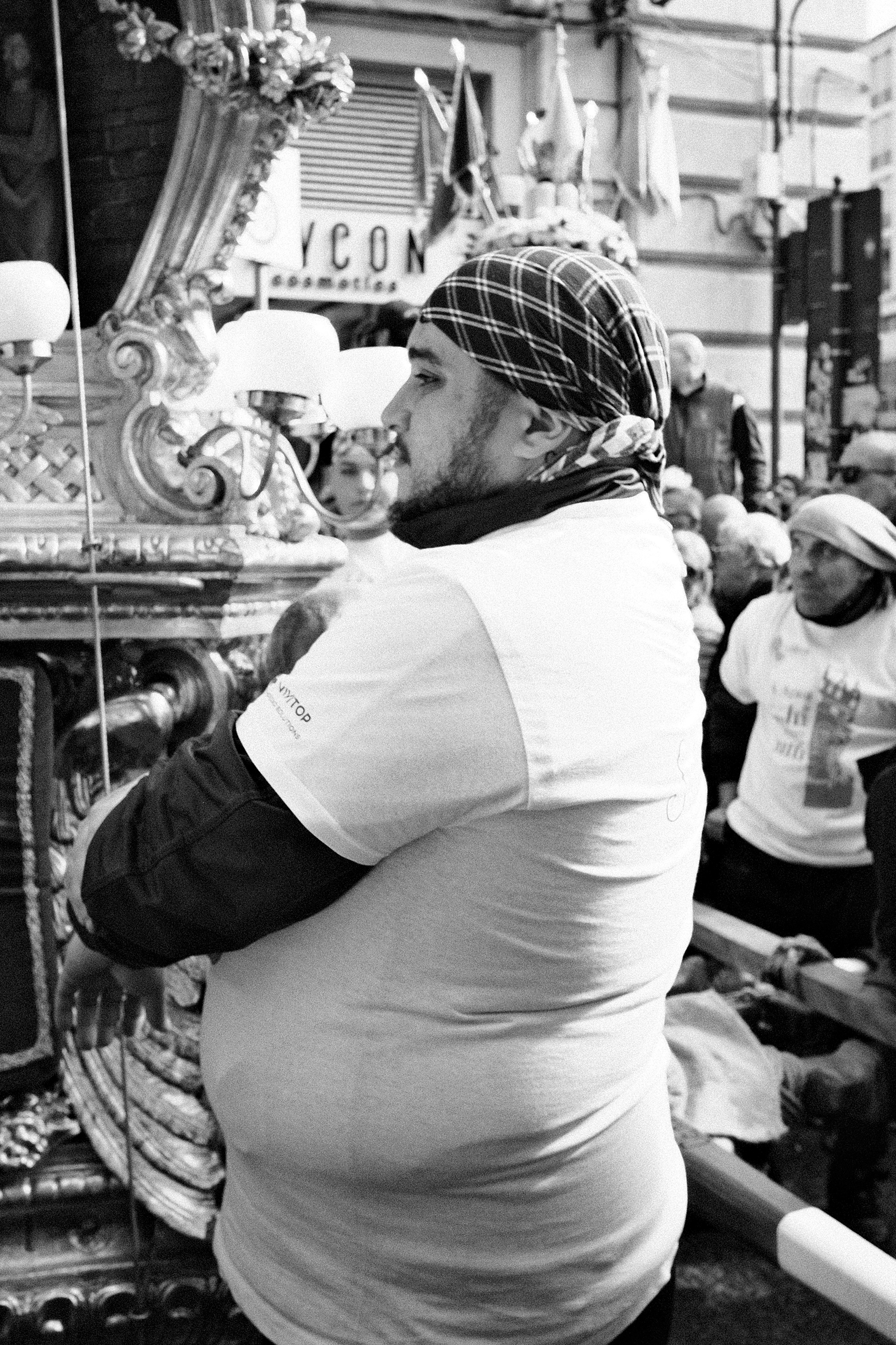 Man with traditional attire for carrying the Candelora.