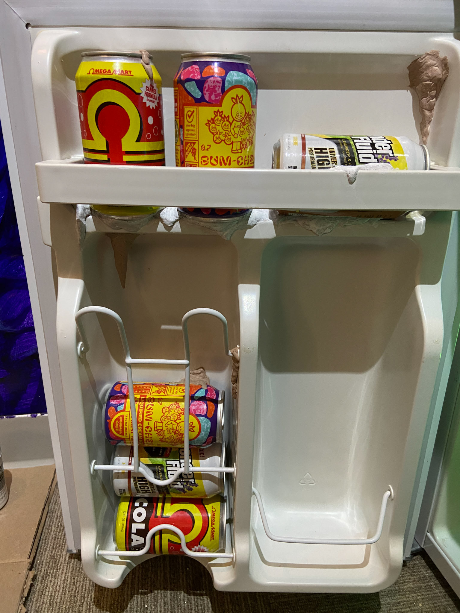 Securing the cans and adding ice and icicles