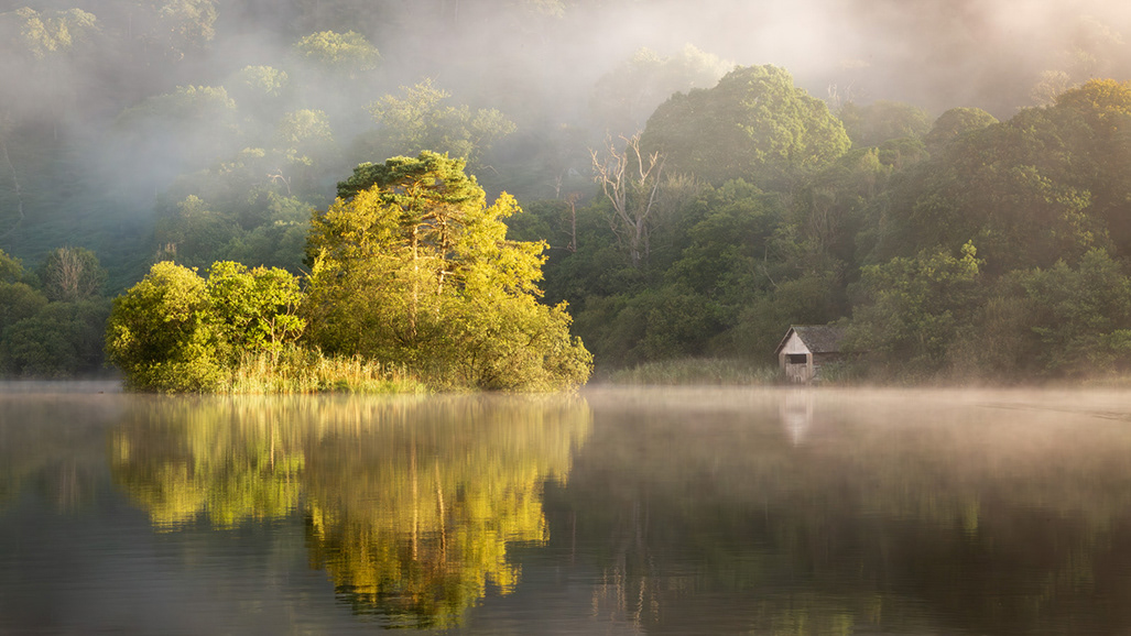 1st Sunrise through the mist by tom swallow