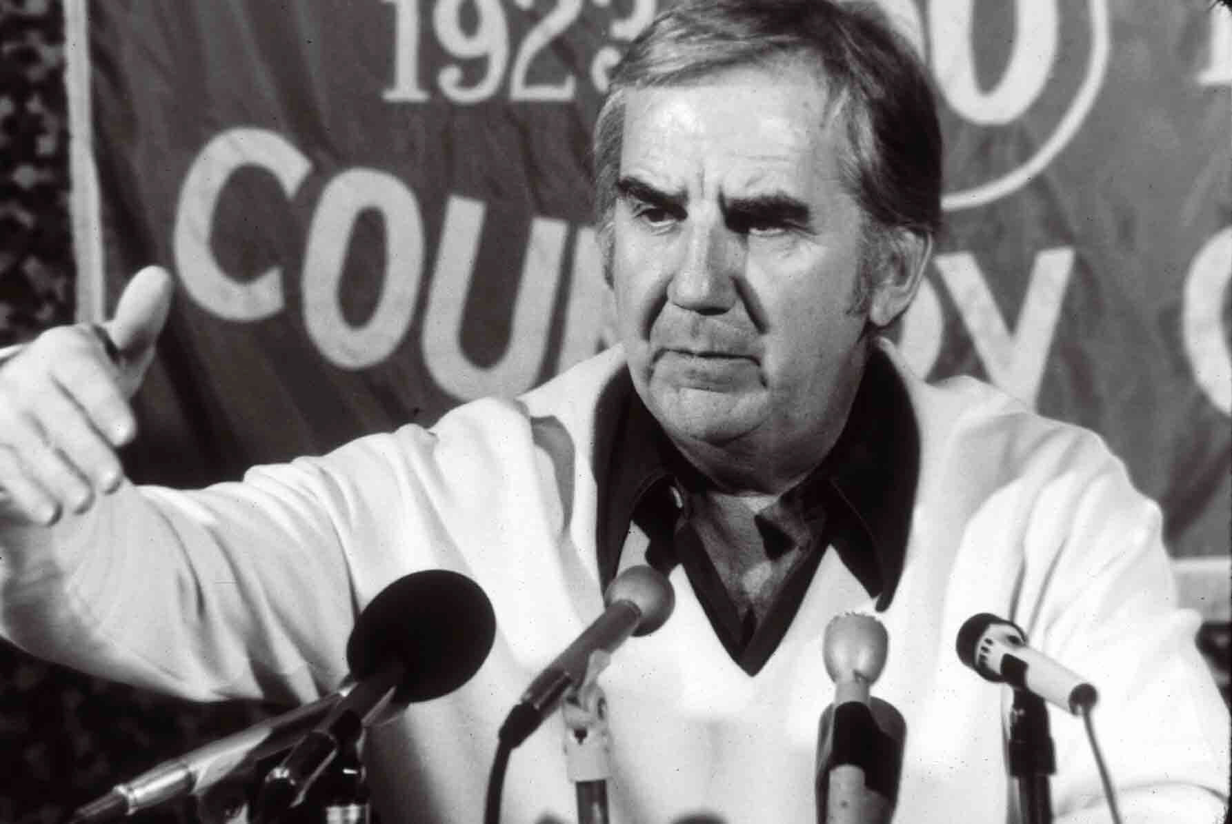 Announcer Ed McMahon catches a fly