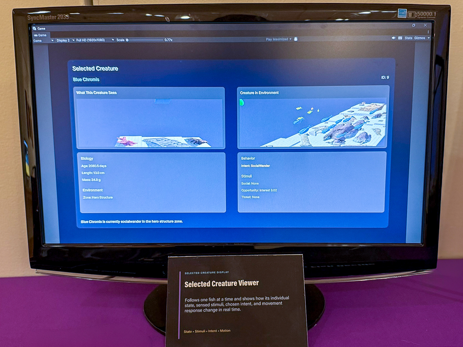 Secondary display setup — Screens reveal system data and selected creature information.