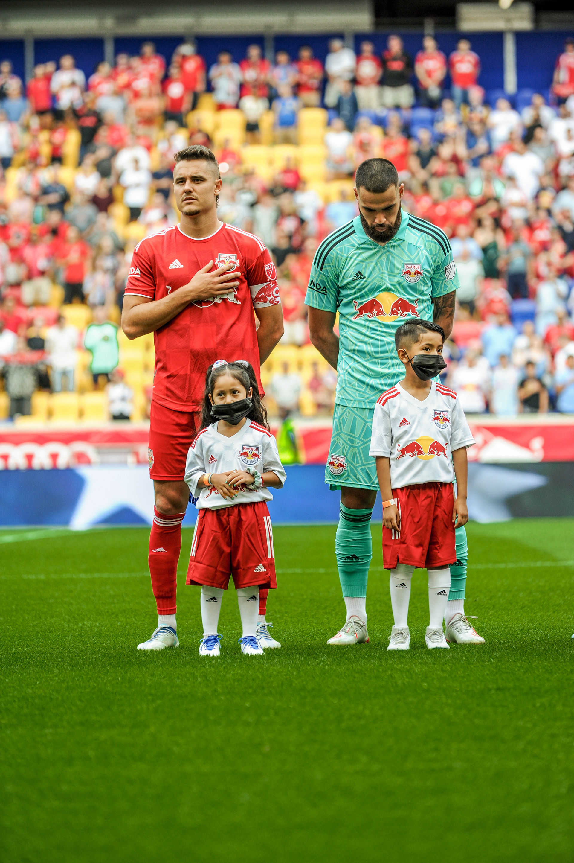 Aaron Long and Carlos Coronel Mid-National Anthem