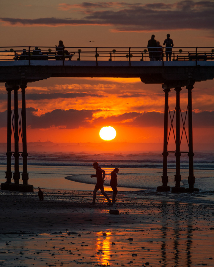 Saltburn sunset under the pier