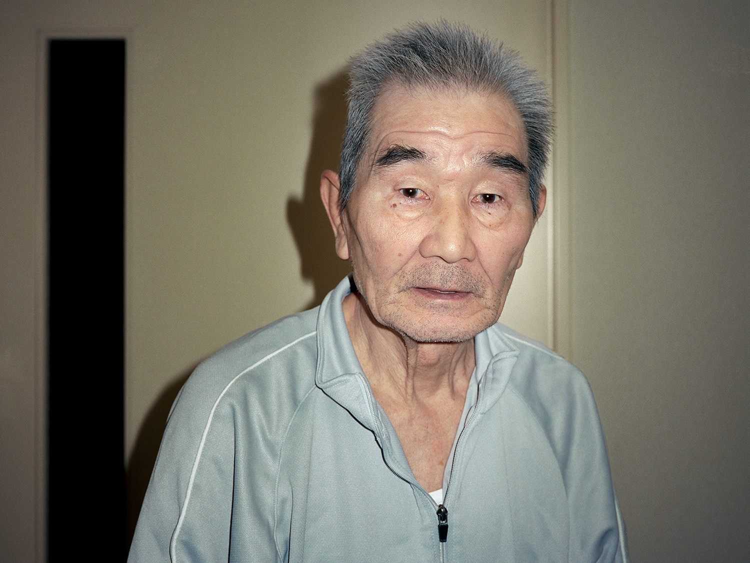 My reunion with my father was much more peaceful and awkward than I had feared. He did not look much different from before, but compared to a few months earlier, it was uncomfortable, like watching a puppet move in his likeness. I tried to be cheerful and talk to him as if this reunion was a precious experience, but his response was much slower than I had imagined. I took a picture of him and my mother, saying, "This is a good opportunity, so” My father will never come back to us. There is an invisible wall between me and my father in front of me. My father has already left for somewhere far away. Alone, as always. But at the same time, it also means that my mother and I have been released from the responsibility of caring for my father. Silently biting back relief and sadness, I spent a short time with my father with a fake smile on my face.