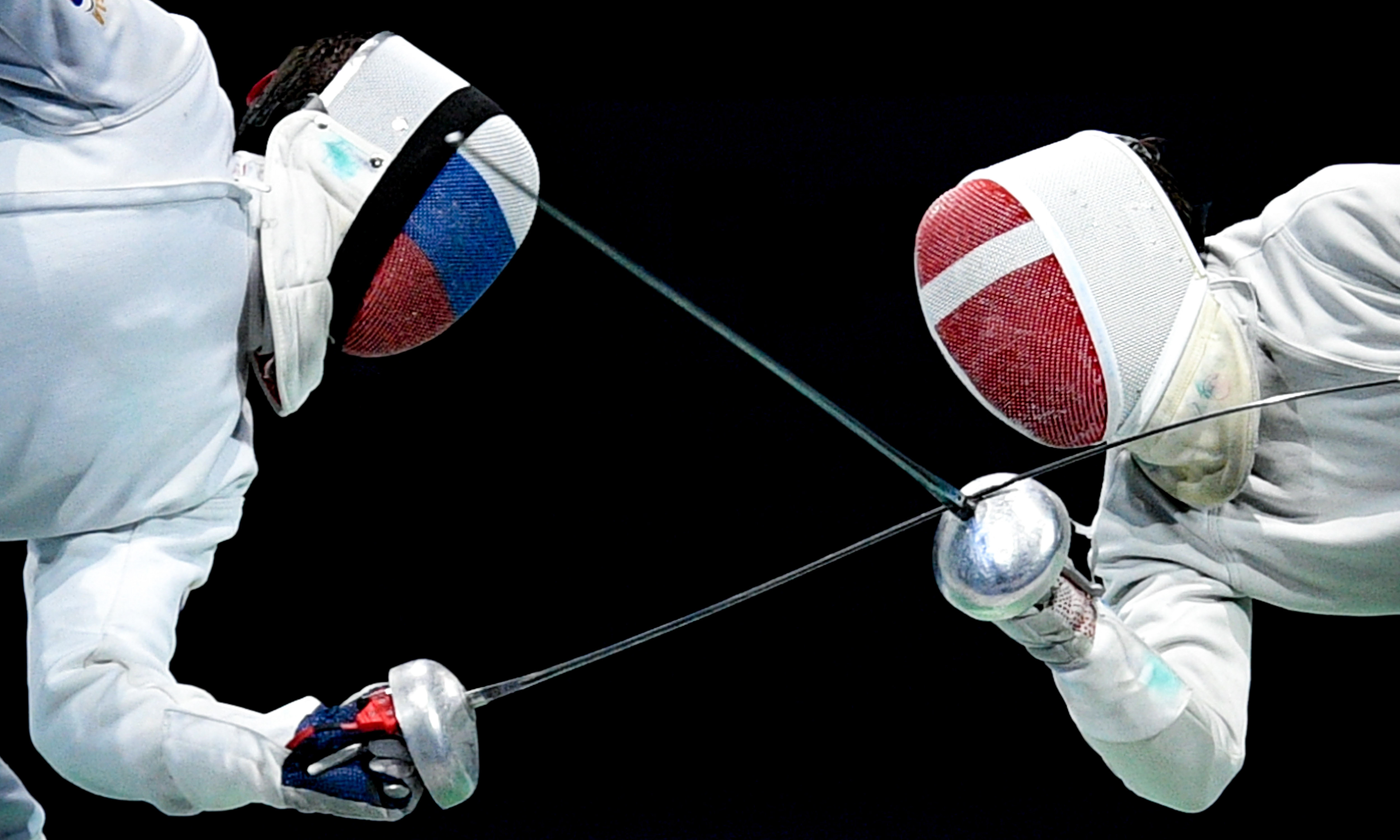 Athletes of Russia (L) and Denmark (R) compete in the epee men's team final of the 2019 Fencing European Championships in Duesseldorf, Germany, 21 June 2019. (Photo by Sascha Steinbach/epa)