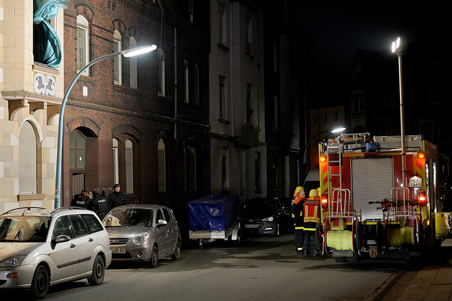 Firefighters park in a street after an apartment fire was extinguished in Herne, Germany, 09 March 2017. After a manhunt, German police arrested one person believed to be 19-year-old Marcel H. who after his arrest pointed police to a fire in an apartment in Herne in which two bodies were found. (Photo by Sascha Steinbach/epa)