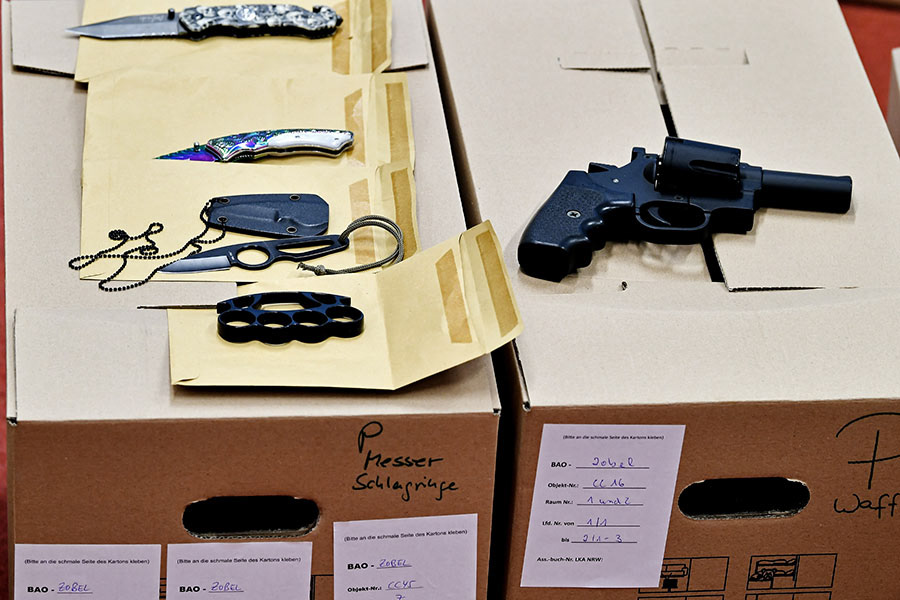 Confiscated weapons, drugs, cash money about 330,000 € and other items are on display at the main customs office in Krefeld, Germany, 30 January 2018. Thousands of special police and customs units were engaged in nationwide raids targeting organised illicit labour. (Photo by Sascha Steinbach/epa)