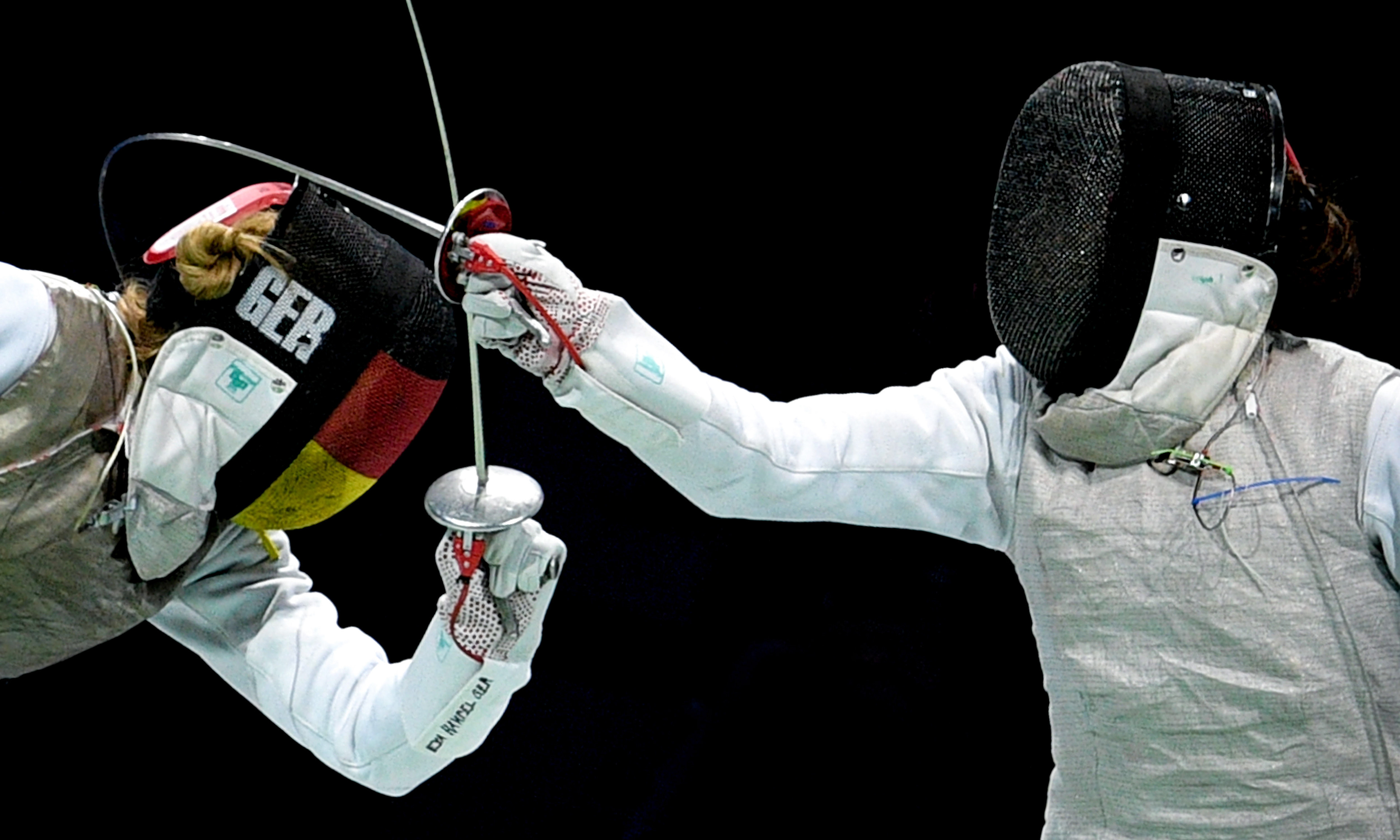 Athletes of Germany (L) and Italy (R) compete in the foil women's team third place bout of the 2019 Fencing European Championships in Duesseldorf, Germany, 21 June 2019. (Photo by Sascha Steinbach/epa)