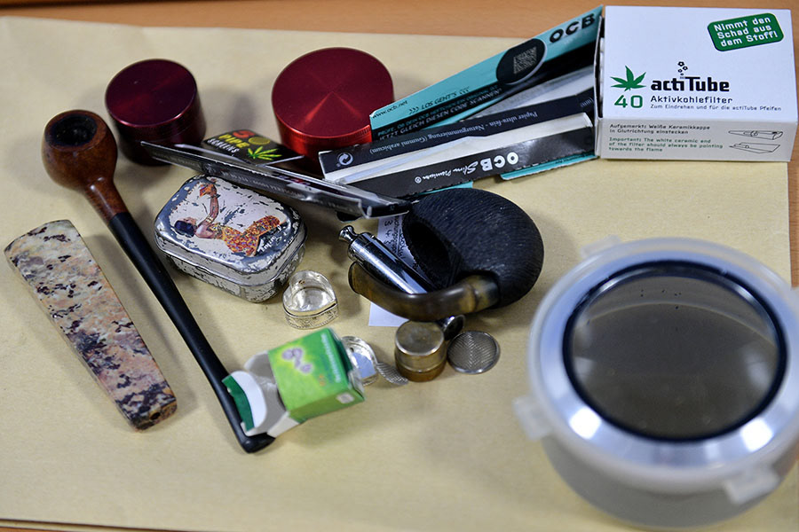 Confiscated weapons, drugs, cash money about 330,000 € and other items are on display at the main customs office in Krefeld, Germany, 30 January 2018. Thousands of special police and customs units were engaged in nationwide raids targeting organised illicit labour. (Photo by Sascha Steinbach/epa)