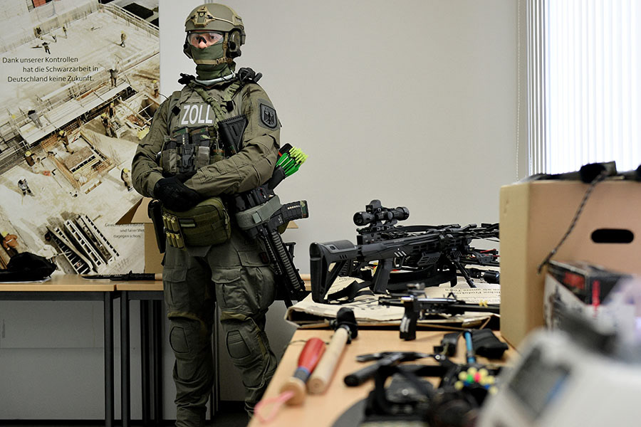 Confiscated weapons, drugs, cash money about 330,000 € and other items are on display at the main customs office in Krefeld, Germany, 30 January 2018. Thousands of special police and customs units were engaged in nationwide raids targeting organised illicit labour. (Photo by Sascha Steinbach/epa)