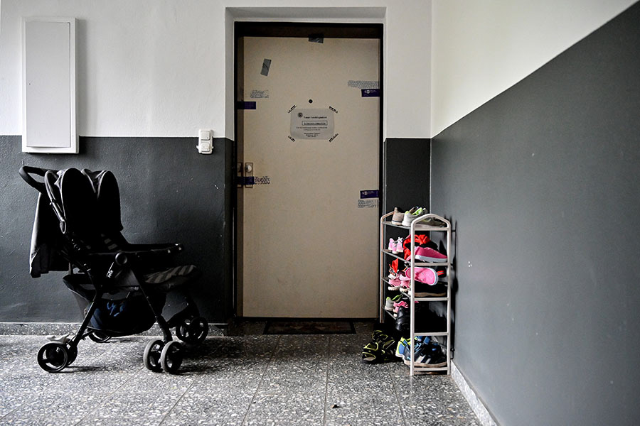 Kids shoes and a stroller are seen in front of the entrance door to an apartment that has been sealed by the police after five children found dead, in Solingen, Germany, 04 September 2020. Five dead children aged one to eight years were found in an apartment house on 03 September 2020. (Photo by Sascha Steinbach/epa)