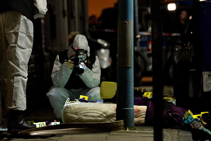 Police Officers in a street after an apartment fire was extinguished in Herne, Germany, 09 March 2017. After a manhunt, German police confirme they arrested 19-year-old Marcel H. who after his arrest pointed police to a fire in an apartment in Herne in which two bodies were found. (Photo by Sascha Steinbach/epa)
