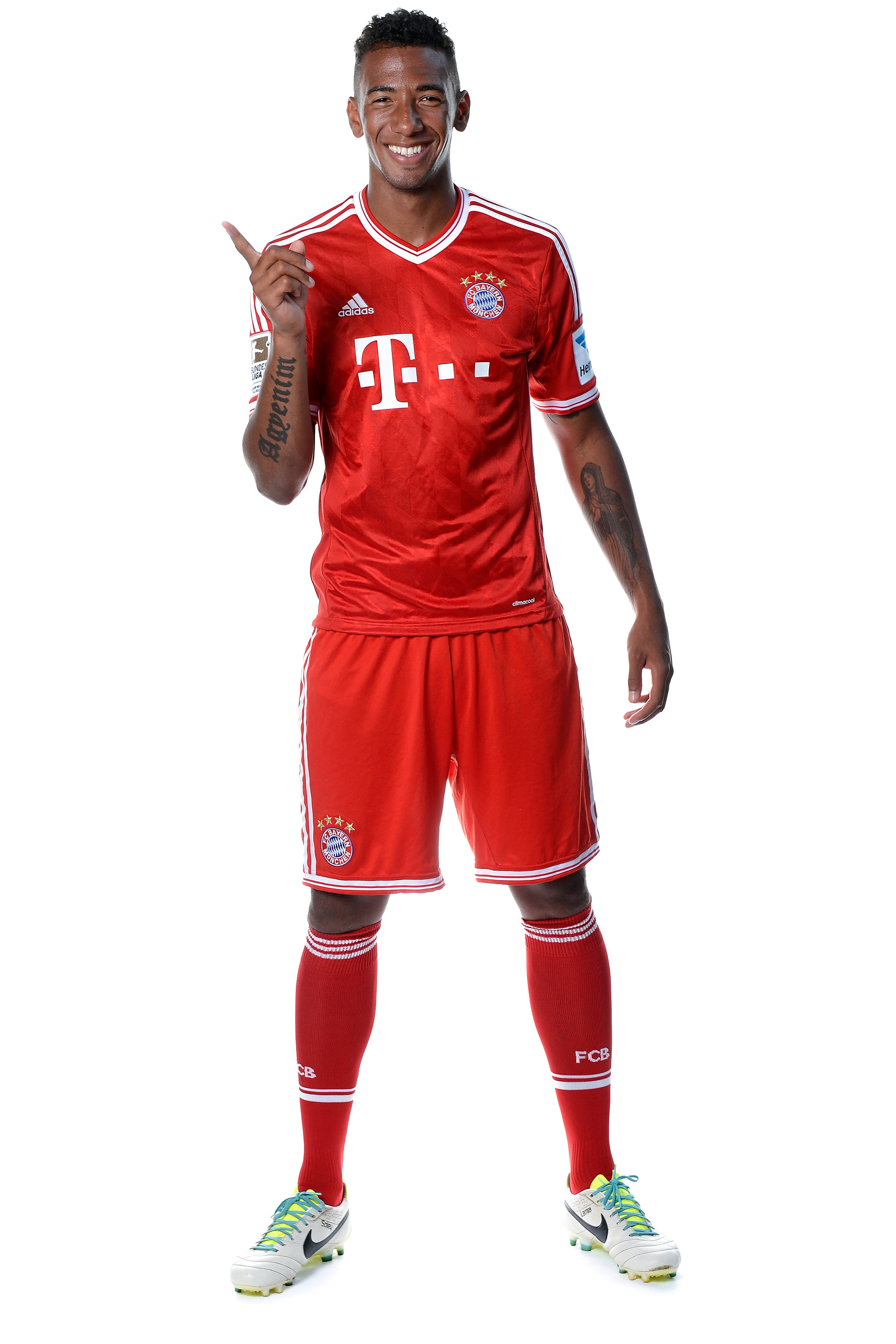 Jerome Boateng poses during the FC Bayern Muenchen Team Presentation for DFL on July 18, 2013 in Munich, Germany. (Photo by Sascha Steinbach/Getty Images)