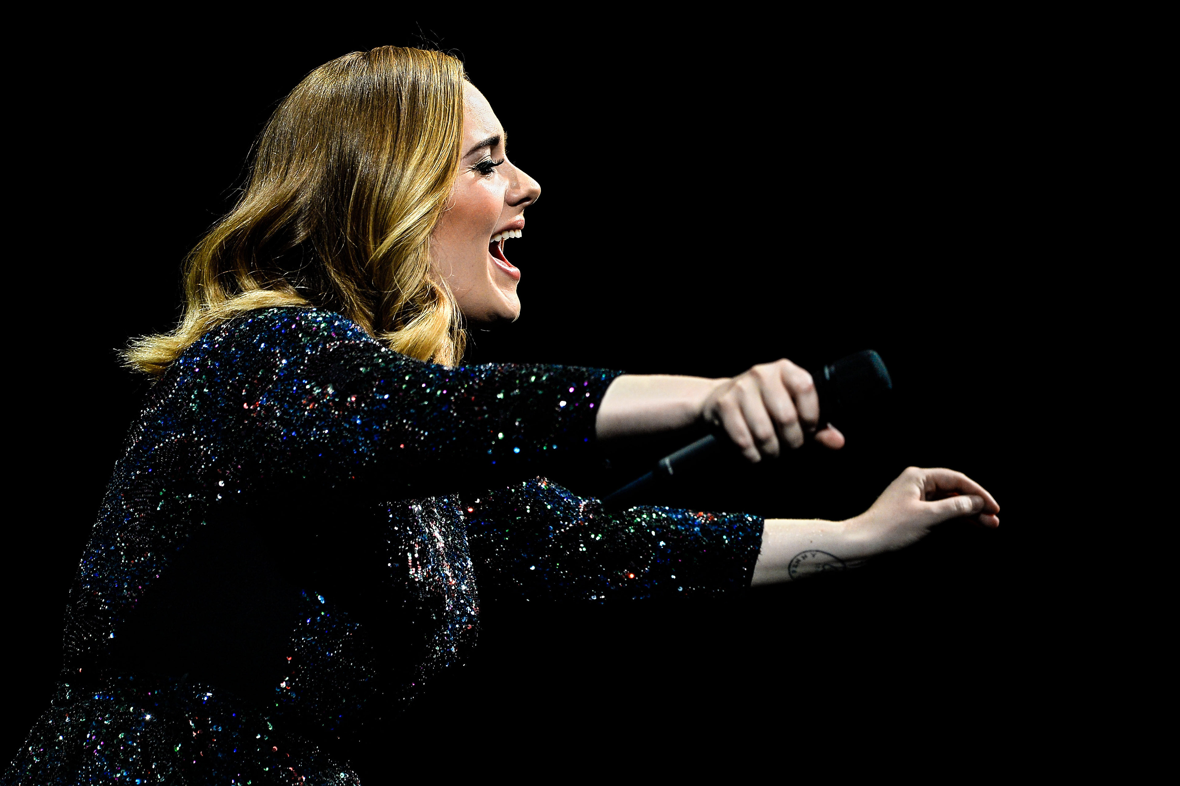 British singer Adele performs at SportPaleis in Antwerpen, Belgium, 12 June 2016. (Photo by Sascha Steinbach/Getty Images For Adele)