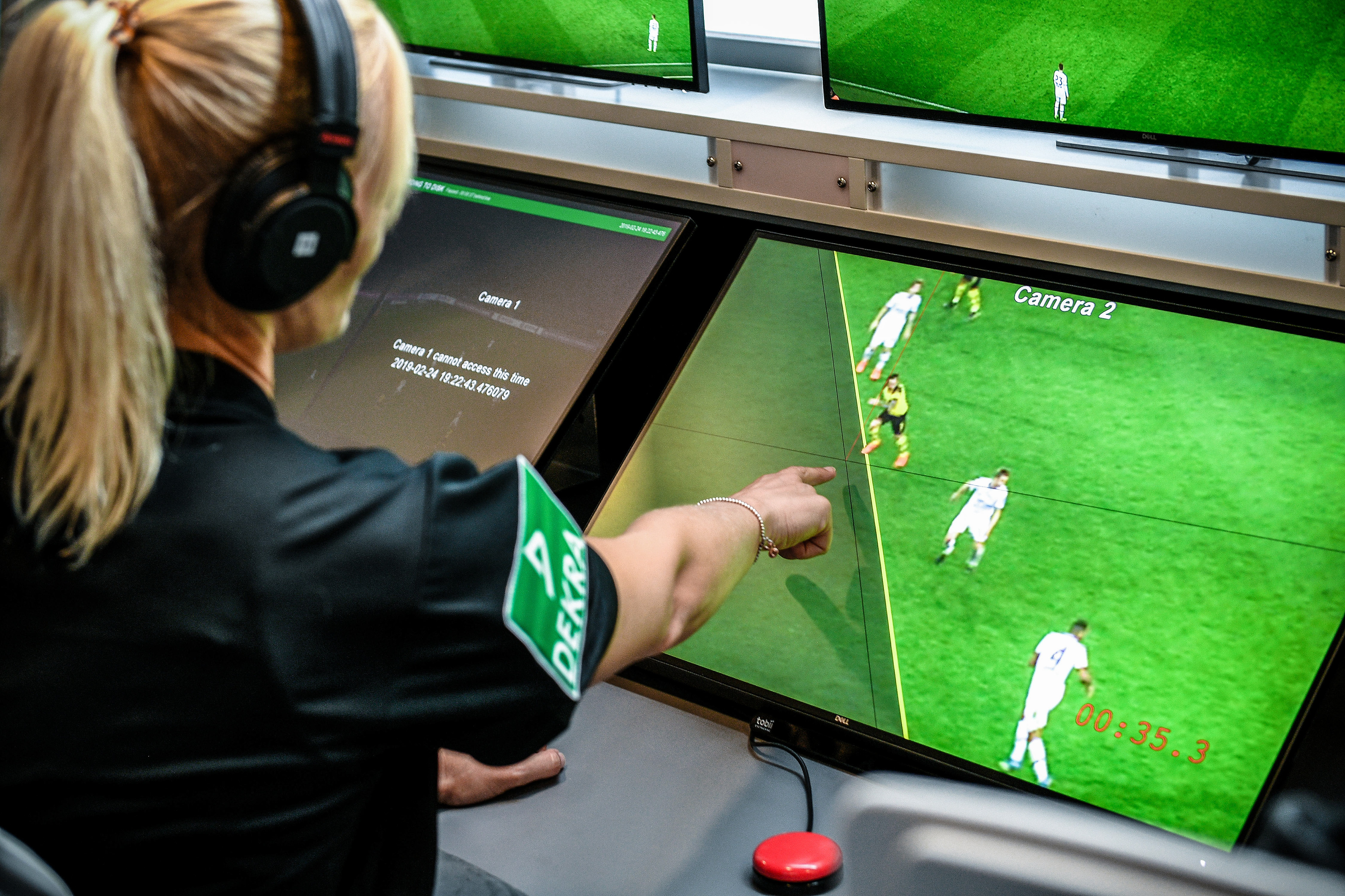 Referee Bibiana Steinhaus reacts as she sits in front of monitors in the redesigned and expanded Video Assist Center in Cologne, Germany, 05 August 2019. (Photo by Sascha Steinbach/epa)